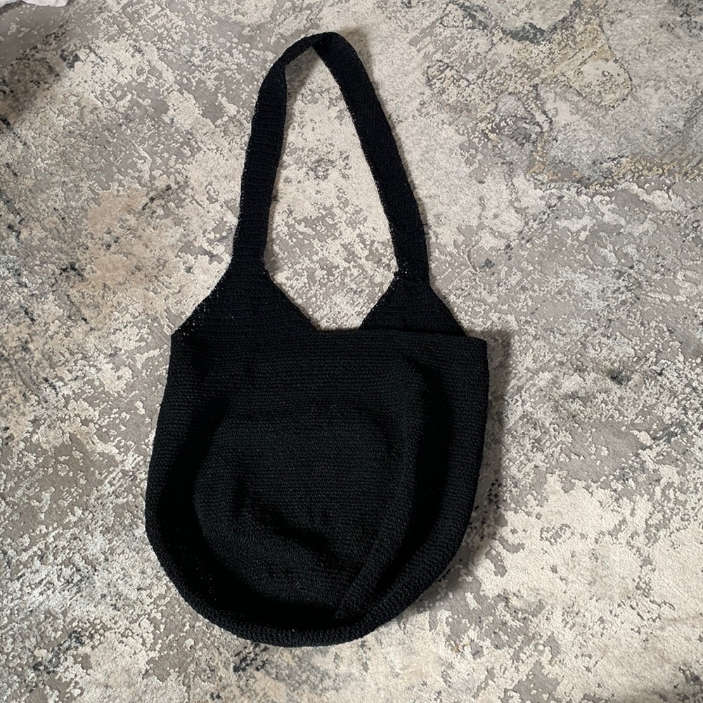 Black woven bucket bag